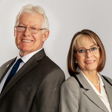 London real estate agents Michael McClemont & Carmen McClemont standing together for their agent headshot! Together, Michael & Carmen make up the McClemont Team!